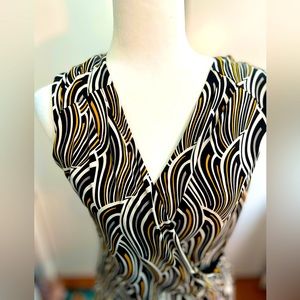 White House Black Market Abstract top size Medium